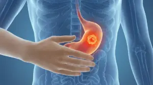 Illustrazione del tratto digestivo con stomaco evidenziato e mano sull’addome, possibile segnale di problema gastrico